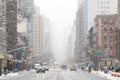 Snowy winter street scene looking down 3rd Avenue in New York City Royalty Free Stock Photo