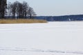 Snowy winter view to lake Royalty Free Stock Photo