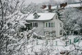 Snowy wooden house. Winter. Mountains and forest Royalty Free Stock Photo