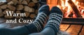 Snug And Cozy A Pair Of Feet In Warm Socks By A Fireplace
