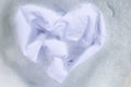 Soak a cloth before washing, white cloth, Heart shape Royalty Free Stock Photo