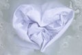 Soak a cloth before washing, white cloth, Heart shape Royalty Free Stock Photo