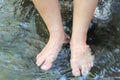 Soak your feet in cool water streams Natural water Relax Royalty Free Stock Photo