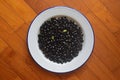 Soaked black soybeans ready to be ground and cooked as beverage Royalty Free Stock Photo