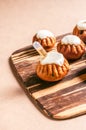 Soaked rum cakes on a board Royalty Free Stock Photo