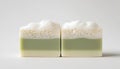 Soap bar with foam on white background, close-up Royalty Free Stock Photo