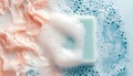 Soap bar with foam on white background, close-up Royalty Free Stock Photo