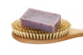 Soap bar with natural ingredients on massage brush