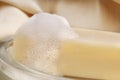 Soap bar and suds Royalty Free Stock Photo