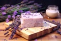 soap bar on a wooden table, lavender sprigs around it Royalty Free Stock Photo