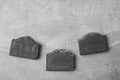 Soap bars handmade from natural charcoal on grey background