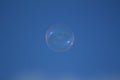 Soap bubble against the blue sky Royalty Free Stock Photo
