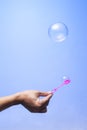 Soap bubble in the blue background sphere color ball, round, circle