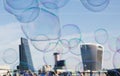 Soap bubble on City of London background as a metaphor for investment bubble