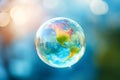 Soap bubble Earth floating in the air. Earth Day, save the planet concept. Ecology and sustainability, fragile world, saving the Royalty Free Stock Photo