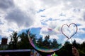 large soap bubble in the shape of a heart in the sky Royalty Free Stock Photo