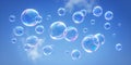 Soap bubbles against a blue sky - 3D illustration Royalty Free Stock Photo