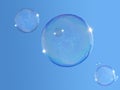 Soap-bubbles on blue sky Royalty Free Stock Photo