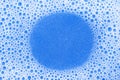 Soap foam. Background of dusty foam with bubbles of blue color for an inscription. Soap sud with copy-space Royalty Free Stock Photo