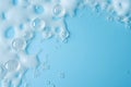 Soap foam, blue water surface texture with bubbles and splashes. Clear water abstract nature background, copy space for text Royalty Free Stock Photo