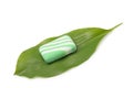 Soap on a green leaf of a lily of the valley Royalty Free Stock Photo