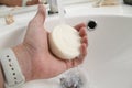 Soap in hand water loeft on the side Royalty Free Stock Photo