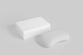 Soap and packaging on grey background, front view. for mockup design Royalty Free Stock Photo