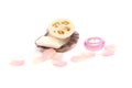 Soap in a seashell, candle, loofah and rose petals Royalty Free Stock Photo