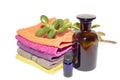 Soapdish on top of facecloths with bottles Royalty Free Stock Photo