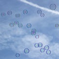 Soapbubbles flying in the sky Royalty Free Stock Photo