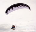 Soaring over the sea in a motorized paraglider