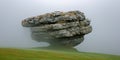 The soaring stone: a huge stone hangs in the air, as if torn from its base and forgotten by ti Royalty Free Stock Photo