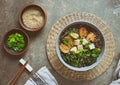 Soba noodle soup with tofu, kale and mushrooms Royalty Free Stock Photo