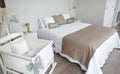 Bedroom with double bed and cot Royalty Free Stock Photo