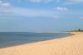 Sobieszewo Island - The shore of a sandy beach by Baltic Sea on Sobieszewo island, Poland. The sea is gently waving Royalty Free Stock Photo