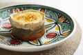 Sobrasada with baked aubergine with caramelized goat cheese. Tapa of the island of Mallorca.