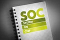 SOC - System On Chip acronym on notepad, technology concept background