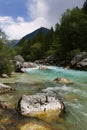 Majestic turquoise Soca river in the green forest, Bovec, Slovenia, Europe. Royalty Free Stock Photo