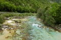 Majestic turquoise Soca river in the green forest, Bovec, Slovenia, Europe. Royalty Free Stock Photo