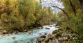 The Soca river flowing through a wild mountain landscape of the Julian Alps in Slovenia Royalty Free Stock Photo