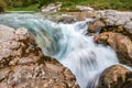 The Soca river flowing through a wild mountain landscape of the Julian Alps in Slovenia Royalty Free Stock Photo