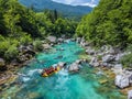 Soca Valley, Slovenia - Aerial view of the emerald alpine river Soca with rafting boats going down the river on a sunny summer day Royalty Free Stock Photo