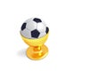 Soccer as food: football in a golden egg cup Royalty Free Stock Photo