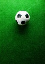 Soccer ball against artificial turf. Studio shot. Copy space. Royalty Free Stock Photo