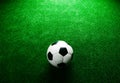 Soccer ball against artificial turf. Studio shot. Copy space. Royalty Free Stock Photo