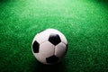 Soccer ball against artificial turf. Studio shot. Copy space. Royalty Free Stock Photo