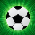Soccer ball on a bright green background with rays of light. Football banner. Concept of healthy lifestyle, sport and activities