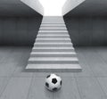 Soccer ball on cement floor with stairs leading. Soccer game concept Royalty Free Stock Photo