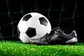 Soccer ball and cleats