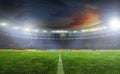 Soccer ball on the field of stadium Royalty Free Stock Photo